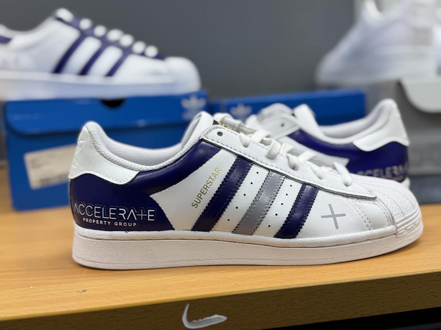 branded sneakers with business logo. Adidas superstar customs
